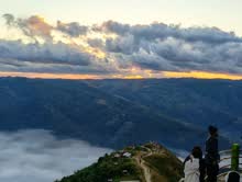 Sunrise over Laitlum Canyon with cloud filling the valley below, Meghalaya